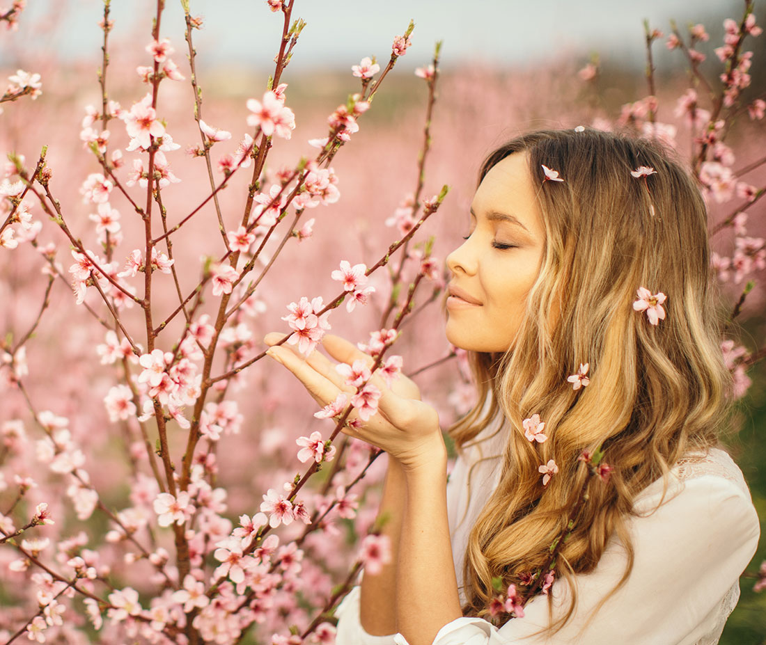 Boston Lip Lift model in flower field